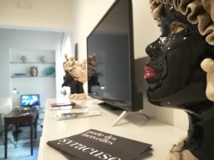 TV a/nebo společenská místnost v ubytování I Santi Coronati