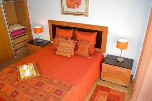 Katil atau katil-katil dalam bilik di Parasol Appartment +19 gambar