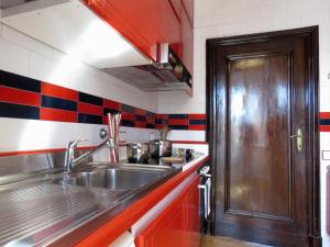 Kuchyň nebo kuchyňský kout v ubytování Montegrappa Apartment