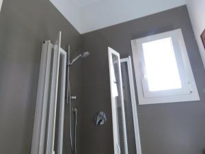 Kúpeľňa v ubytovaní Montegrappa Apartment + 27 fotografií
