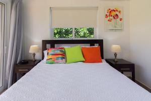 Łóżko lub łóżka w pokoju w obiekcie House 24 in Casa Linda
