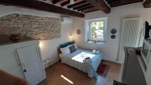 A bed or beds in a room at Casale di Nicolò Még 37 kép