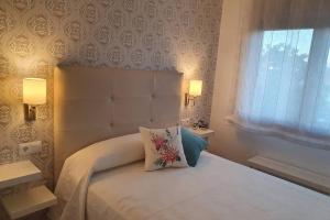 Postel nebo postele na pokoji v ubytování Ático Porto