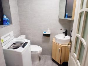 A bathroom at A&G Apartment