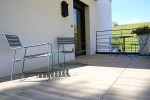 Balkón nebo terasa v ubytování Maison Cube
