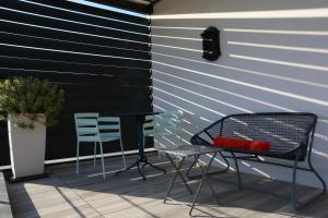 Balkón nebo terasa v ubytování Maison Cube