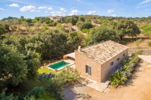an aerial view of a house with a swimming pool at Finca Bonita in Son Servera