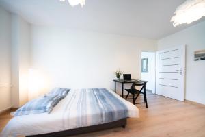 Posteľ alebo postele v izbe v ubytovaní Apartament Blue Sea Gdynia