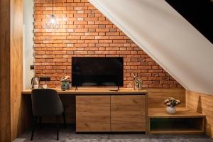 TV a/nebo společenská místnost v ubytování Ostoja Garden