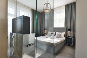 Posteľ alebo postele v izbe v ubytovaní 6 rooms