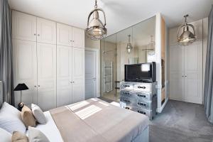 Televízia a/alebo spoločenská miestnosť v ubytovaní 6 rooms