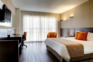 Postel nebo postele na pokoji v ubytování Quality Hotel Curitiba