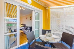 A seating area at Orlando very nice apartment by AltamarHomes