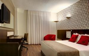 TV a/nebo společenská místnost v ubytování Quality Hotel Curitiba