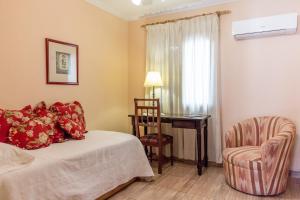Paramanta Lifestyle Hotel tesisinde bir odada yatak veya yataklar