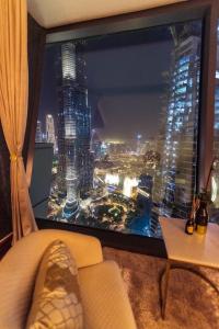منطقة جلوس في FIRST CLASS 3BR with full BURJ KHALIFA and FOUNTAIN VIEW