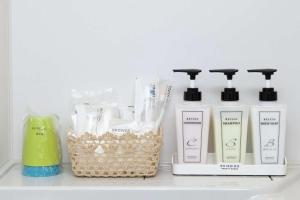 a shelf with a group of products on it at Global Resort Miyajima View in Hatsukaichi