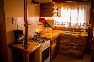 Kuchyňa alebo kuchynka v ubytovaní Patagonia Encantada by DECK