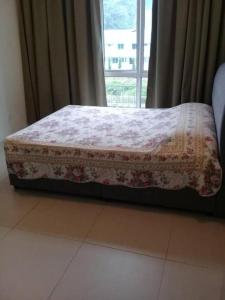 Кровать или кровати в номере Crown Imperial Court Apt at Brinchang Centre