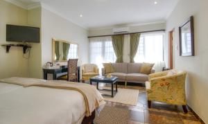 Ένα ή περισσότερα κρεβάτια σε δωμάτιο στο At Heritage House +67 φωτογραφίες
