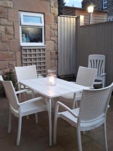 A patio or other outdoor area at Ashwood House Guest House