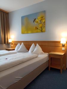 Кровать или кровати в номере Hotel Nummerhof