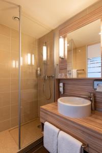 Um banheiro em Star G Hotel Premium München Domagkstraße