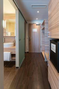 Cama ou camas em um quarto em Star G Hotel Premium München Domagkstraße