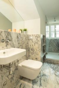 Kylpyhuone majoituspaikassa Cosy Baixa Studio