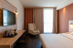 Cama ou camas em um quarto em Star G Hotel Premium München Domagkstraße