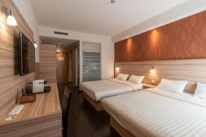 Cama ou camas em um quarto em Star G Hotel Premium München Domagkstraße