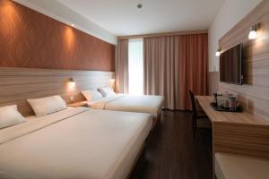 Cama ou camas em um quarto em Star G Hotel Premium München Domagkstraße mais 37 fotos