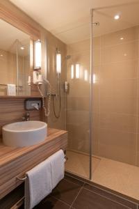 Um banheiro em Star G Hotel Premium München Domagkstraße