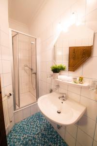 Koupelna v ubytování Hotel Ariston