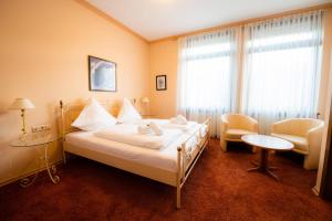 Postel nebo postele na pokoji v ubytování Hotel Ariston