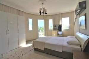 Postel nebo postele na pokoji v ubytování Dalyan Villa Pervin + 62 fotografií