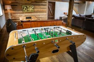 a pool table in the middle of a room at The Old Mill in Liptovský Trnovec