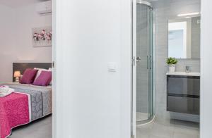 Posteľ alebo postele v izbe v ubytovaní Apart-rent Apartment Gran reserva 0076