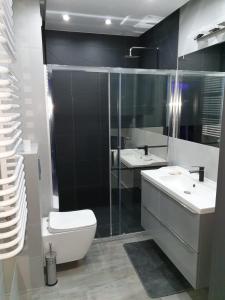 Phòng tắm tại Apartament Skarbowa 1