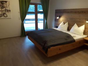 A bed or beds in a room at Appartements Linda
