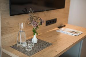 Telewizja i/lub zestaw kina domowego w obiekcie Park Hotel Villa Etschland