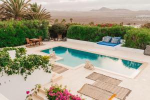 
A view of the pool at thesuites LANZAROTE Casa Sua or nearby
