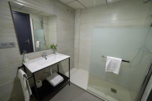 Kúpeľňa v ubytovaní Apartamentos Santa Clara