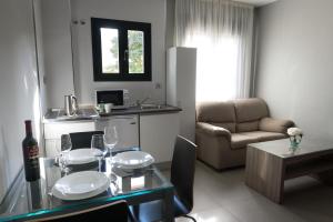 Posedenie v ubytovaní Apartamentos Santa Clara
