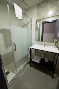 Kúpeľňa v ubytovaní Apartamentos Santa Clara