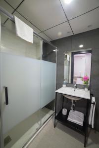 Kúpeľňa v ubytovaní Apartamentos Santa Clara