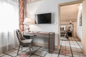 โทรทัศน์และ/หรือระบบความบันเทิงของ Aries Hotel & SPA Wisła