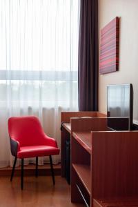 TV a/nebo společenská místnost v ubytování Star G Hotel München Schwabing