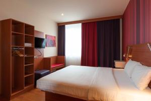 Postel nebo postele na pokoji v ubytování Star G Hotel München Schwabing