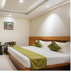 Postel nebo postele na pokoji v ubytování Hotel Kheni